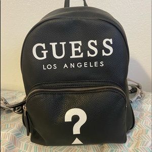 used GUESS mini backpack